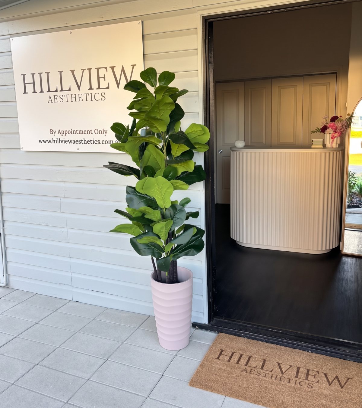 The Hillview Aesthetics sign beside the clinic entrance